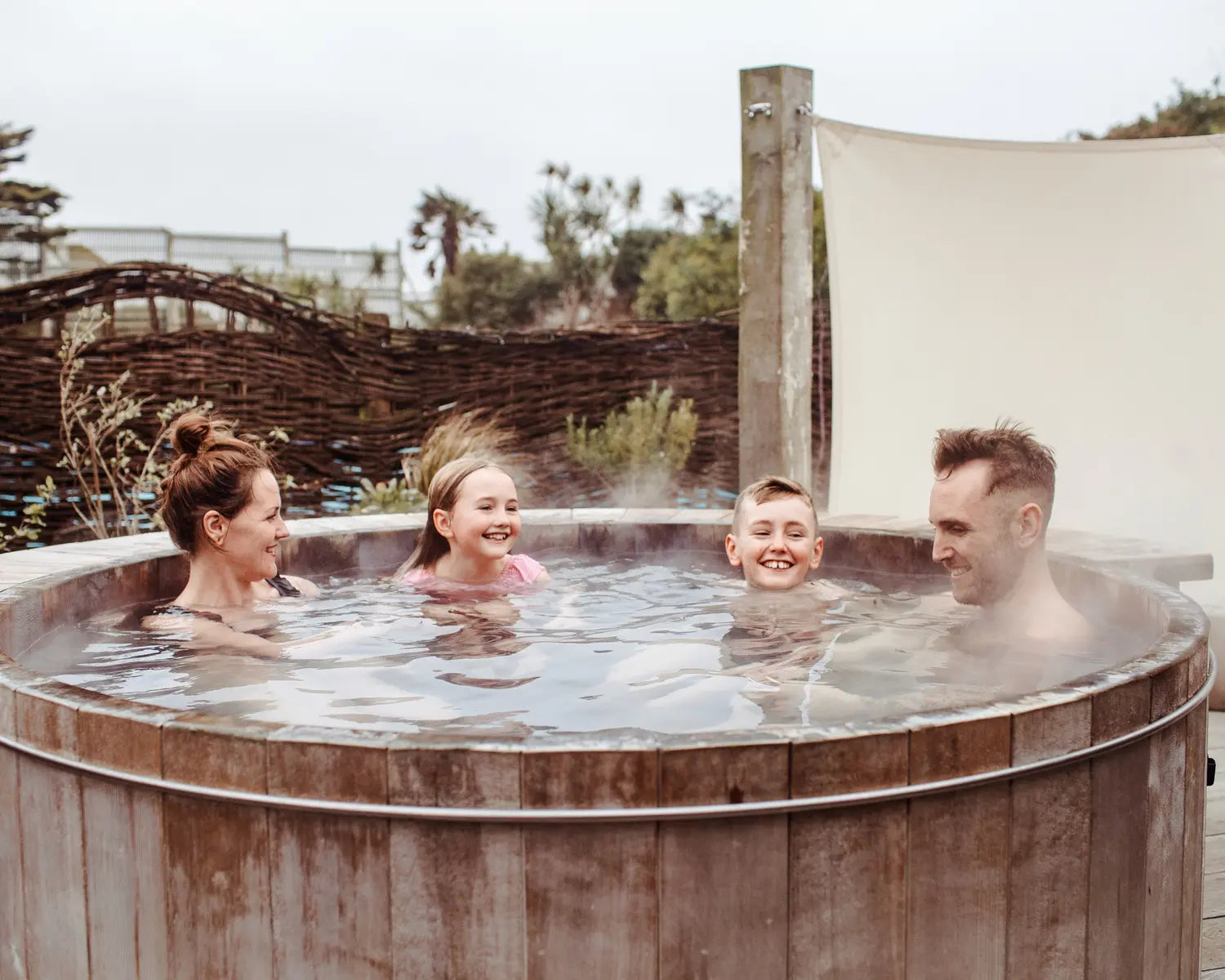 family in hot tub at Bedruthan