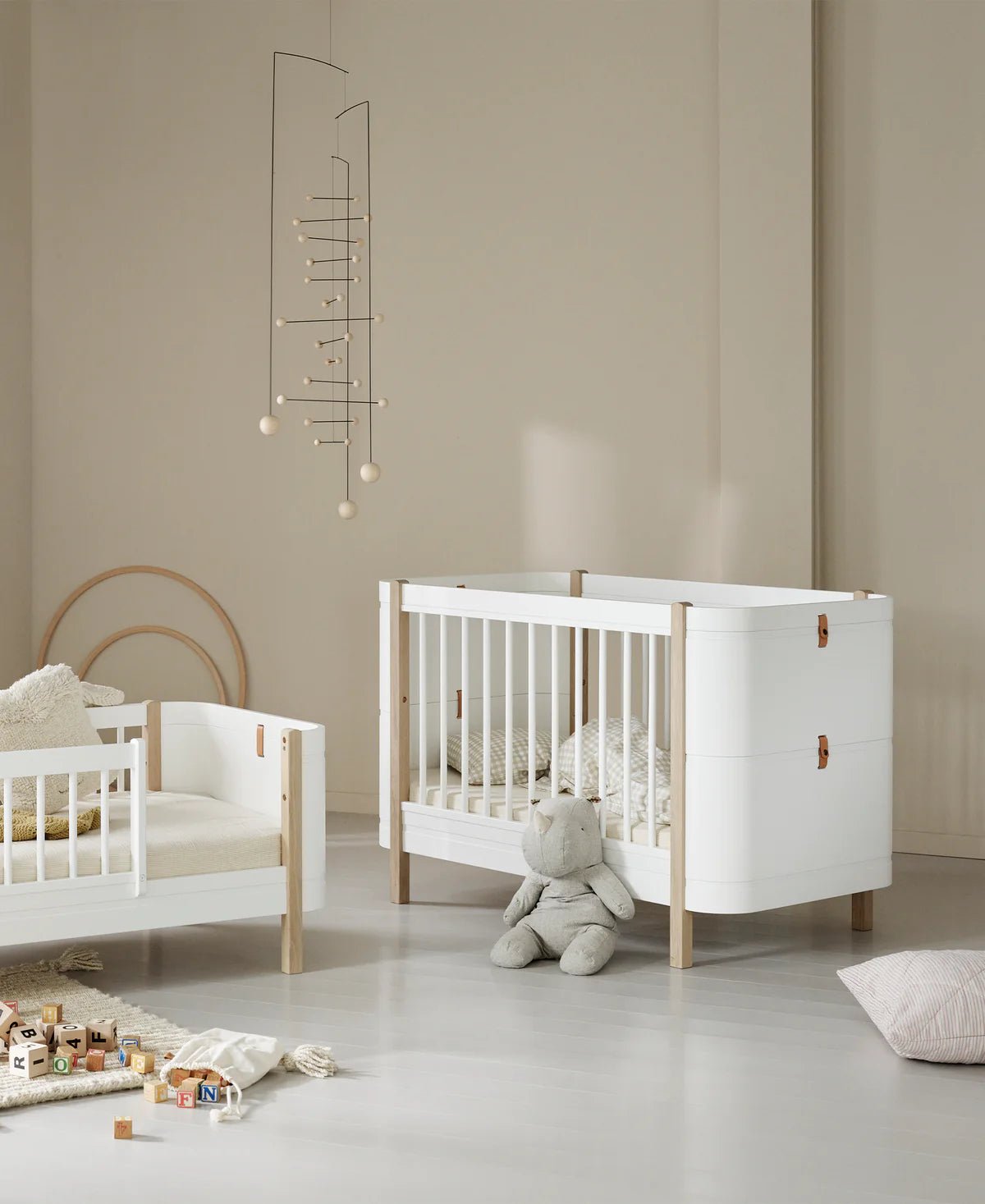 Oliver Furniture | Wood Mini+ Cot Bed Including Junior Kit in White/Oak - Bubba & Me